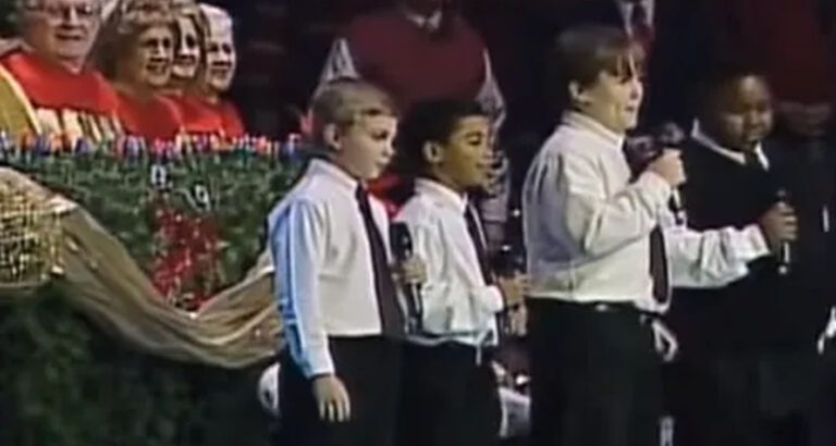 Four boys singing in church is the funniest thing I’ve seen. Keep your eyes on the boy in the vest